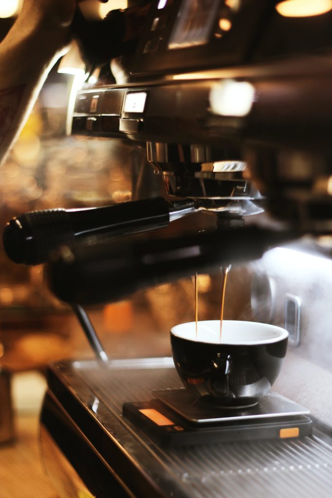 Expresso machine making coffee