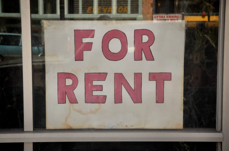 A sign that says "for rent"
