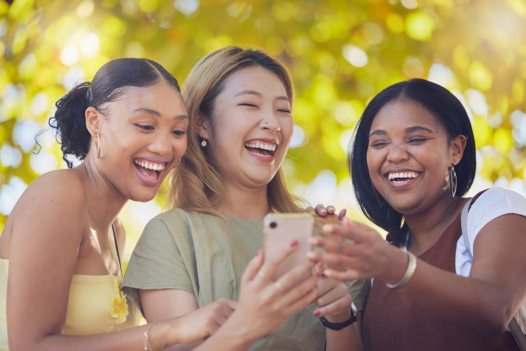 Asian American women with African American friends