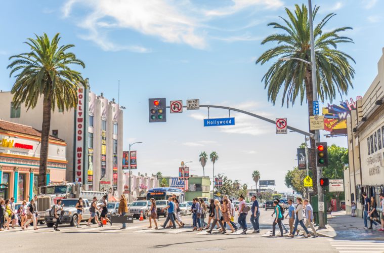 people crossing the street at Hollywood blvd